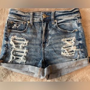AE NEXT LEVEL STRETCH RIPPED JEAN SHORTS